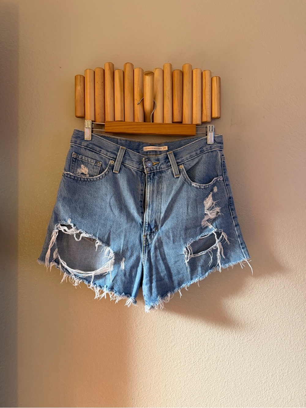 Levi’s High-Rise Distressed Denim Shorts - Light Blue